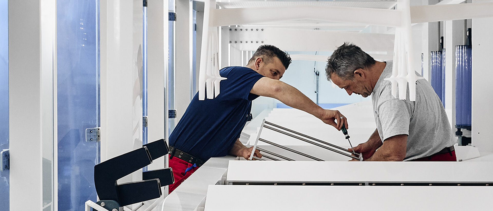 Mechanics working on machine