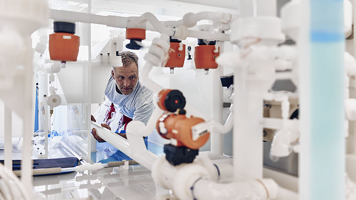 Technician doing maintenance on machine